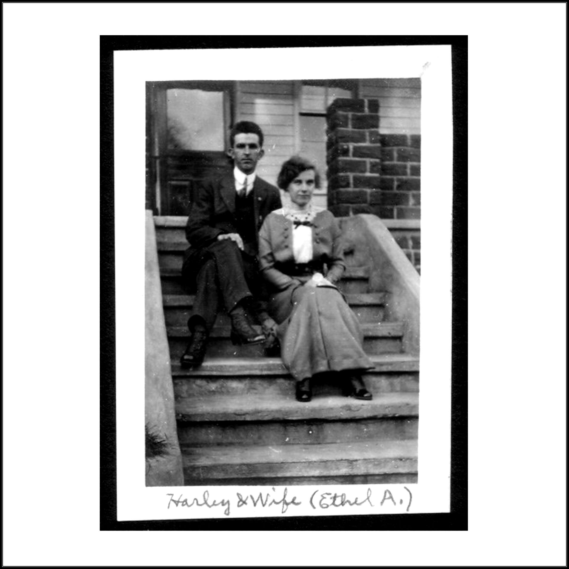 Harley Bowers and Ethel Adaline Bowers sitting on the front steps